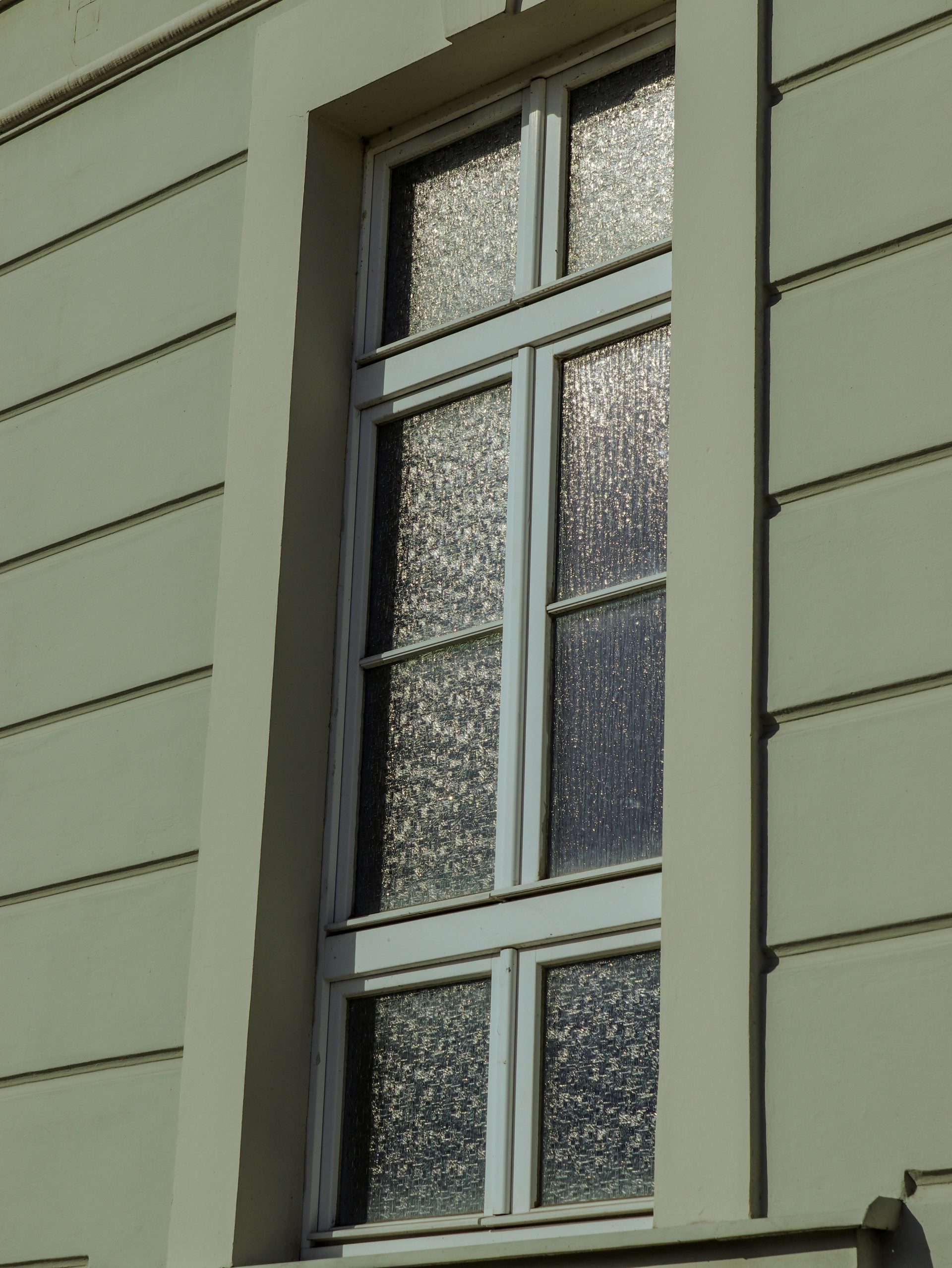 a window with a broken glass